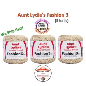 May include: Three balls of Aunt Lydia's Fashion 3 crochet thread in a light beige color. Each ball features a white label with red accents, displaying the brand name, product type, and the text 100% Cotton, Mercerized, and Fashion 3.