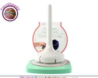 Yarn Dispenser. a rotating base spins to release as you work as you pull yarn. The Spindle height is about 6". Plastic. Made in the USA