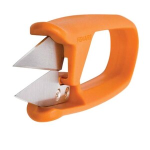 May include: Orange Fiskars snips with two sharp, silver blades. The handle is a bright orange color with the brand name Fiskars printed on the side. The blades are angled and designed for precision cutting.