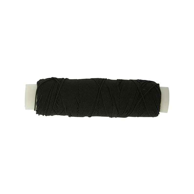 May include: A spool of black elastic cord wrapped around a white plastic cylinder. The cord is wound in a crisscross pattern, creating a textured surface across the length of the spool. The ends of the white plastic core are visible.