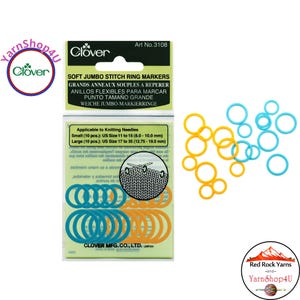 May include: A package of Clover Soft Jumbo Stitch Ring Markers with the text "SOFT JUMBO STITCH RING MARKERS". The package contains blue and orange stitch markers. The package also includes the text "Applicable to Knitting Needles".