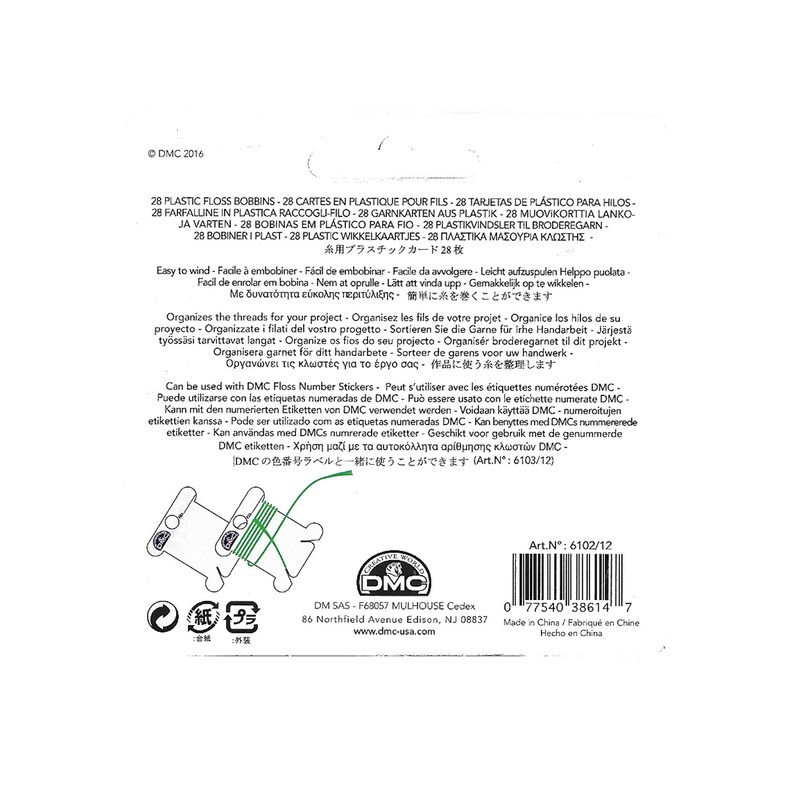 May include: A pack of 28 plastic bobbins for embroidery floss. The bobbins are green and white. The packaging includes a DMC logo and the text "Art.N&deg;: 6102/12".