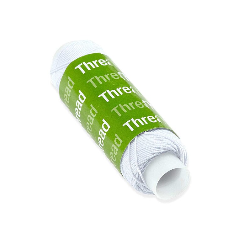 May include: A spool of white thread wrapped around a white cylindrical core. A bright green paper label is wrapped around the center of the thread, featuring the word Thread printed repeatedly in white text across the surface of the label.