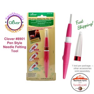 May include: A pink Clover #8901 Pen Style Needle Felting Tool with a clear cap and three needles. The packaging includes instructions and the text "For small and delicate felt projects using 1, 2 or 3 needles."