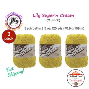 May include: Three balls of yellow Lily Sugar'n Cream yarn, each weighing 2.5 oz and measuring 120 yds. The yarn balls feature a white paper label with the text Lily Sugar'n Cream. The image includes the text Lily Sugar'n Cream (3 pack).