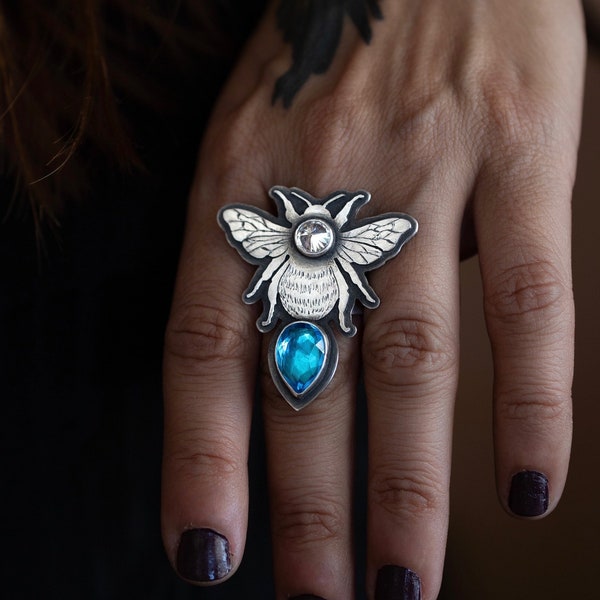 Size US 7.50/7.75 Sterling silver bee ring with blue Topaz