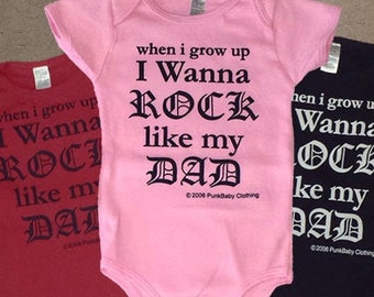 I Wanna Rock Like My Dad hand screen printed cotton, pink, red, or black infant onesie for Dad's baby sidekick