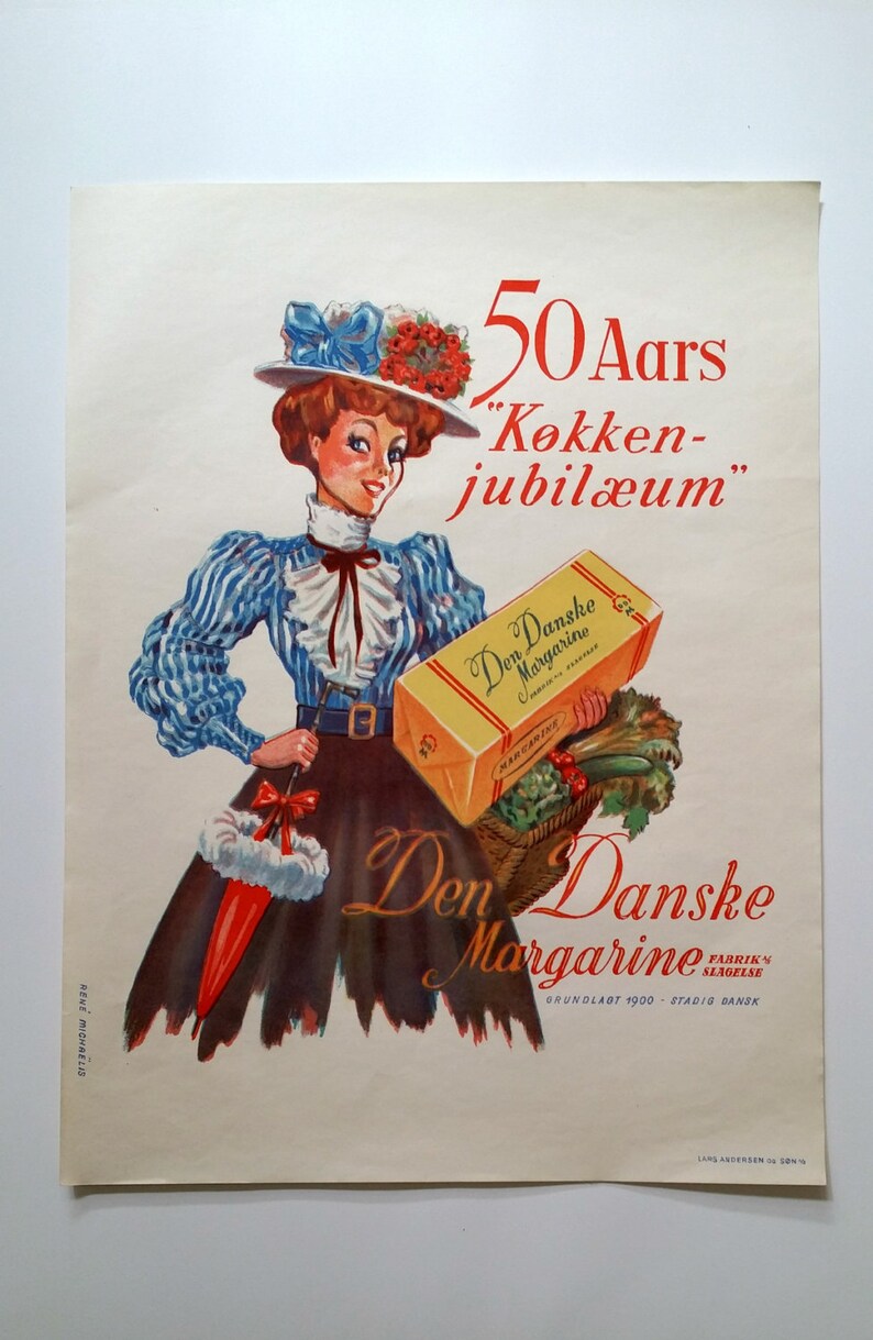 May include: A vintage advertisement for Den Danske Margarine, featuring a woman in a blue and white striped dress and a red hat holding a box of margarine. The text reads "50 Aars K&oslash;kken-jubil&aelig;um" and "Den Danske Margarine".