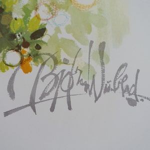 Op de afbeelding: Een zilveren inktsignatuur op een witte achtergrond met een groen en geel aquarelontwerp in de linkerbovenhoek. De handtekening luidt "Brigit W&auml;sthed".