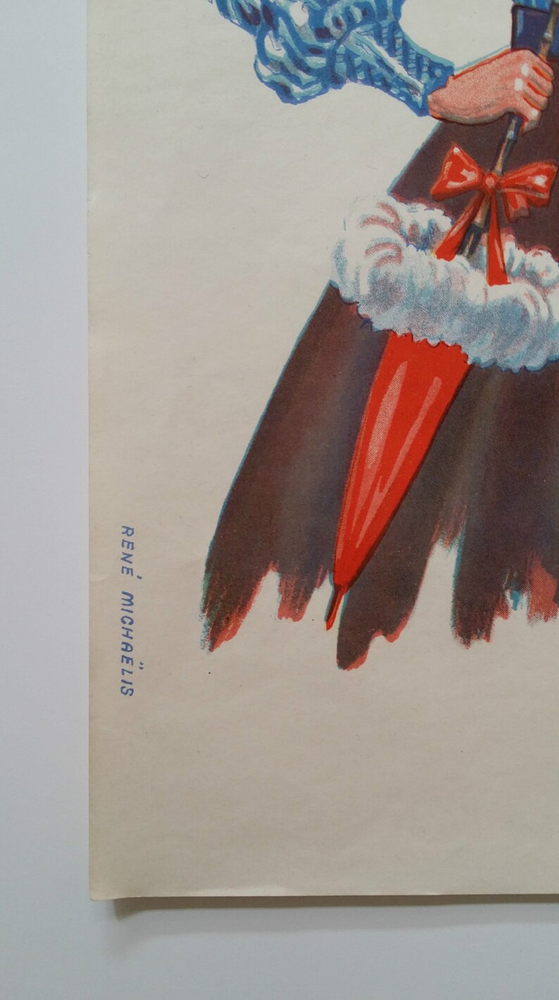 May include: A vintage poster featuring a woman in a blue and white dress holding a red umbrella with a white trim. The woman is wearing a red bow and a white fur trim around her waist. The poster is signed "Ren&eacute; Micha&euml;lis."