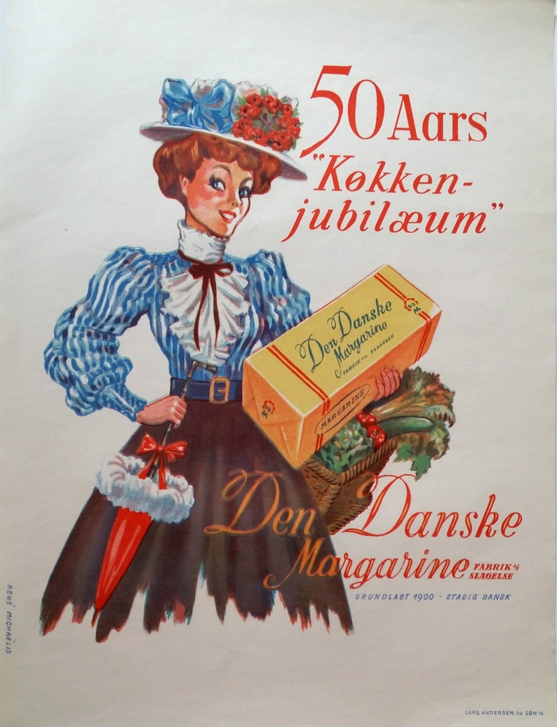 May include: A vintage advertisement for Den Danske Margarine, featuring a woman in a blue and white dress holding a box of margarine. The text reads "50 Aars "K&oslash;kken-jubil&aelig;um" Den Danske Margarine Fabrikn Slagelse Grundlagt 1900 Stadig Dansk".