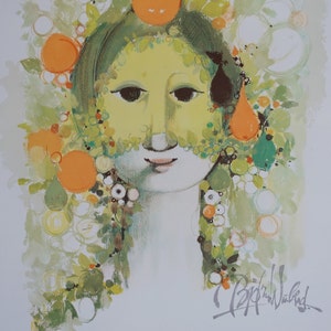 Op de afbeelding: Een vintage poster met een kleurrijke illustratie van een vrouwengezicht omringd door groene bladeren, bloemen en fruit. De tekst op de poster luidt "Bjorn Wiinblad und Das Theater &Ouml;sterreichisches Theatermuseum".