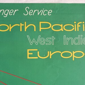 May include: A green poster with white text that reads "Passenger Service" and yellow text that reads "North Pacific West Indies Europe". There are two red arrows pointing up and down.