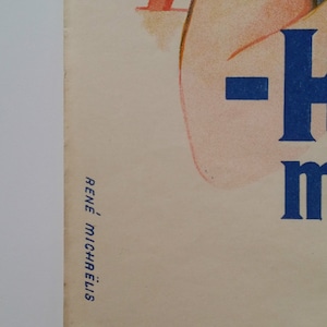 May include: A vintage poster featuring a woman in a blue and white polka dot swimsuit. The poster is in a faded, vintage style and has the text "Rene Michaelis" in the bottom left corner.