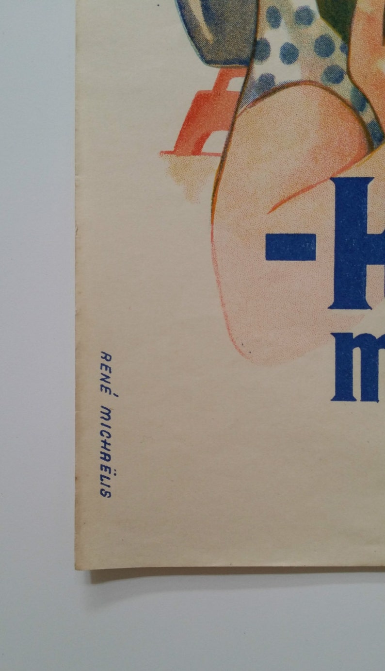May include: A vintage poster featuring a woman in a blue and white polka dot swimsuit. The poster is in a faded, vintage style and has the text "Rene Michaelis" in the bottom left corner.