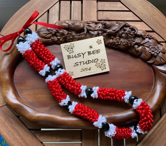 Hawaiian Red Pikake with White Trim and Kukui Nut Ribbon Lei (1” wide)