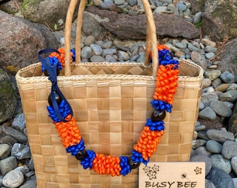 Hawaiian Orange and Royal Blue Pikake Kukui Nut Ribbon Lei