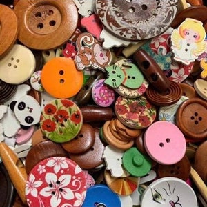 50g Random Assorted Mixed Buttons all shapes and sizes.