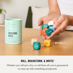 May include: A set of six colorful dice with words printed on each side. The dice are 1 inch in size and are packaged in a green tube with the words "Writing Dice" printed on it. The dice are designed to inspire creative writing.
