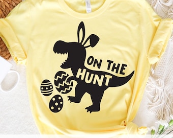 Easter Egg Hunt Svg Png, On The Hunt, Easter Saurus Rex Dinosaur with Bunny Ears, Kid, Boy, Girl, Easter Shirt Design, Svg, Dxf, Cut File