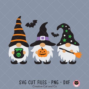 May include: Three Halloween gnomes with black, purple, and green hats. The gnome on the left is holding a cauldron with a skull and green liquid. The gnome in the middle is holding a jack-o-lantern. The gnome on the right is holding a broom.