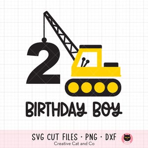 May include: A yellow construction crane with black tracks lifts a black number two. The text "Birthday Boy" is below the crane.