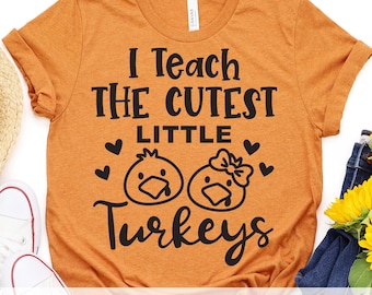 I Teach the Cutest Little Turkeys SVG PNG DXF | Funny Elementary Kindergarten Teacher Thanksgiving Shirt Design | Cute Turkey Faces Cut File