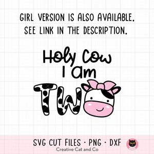 May include: A black and white cow graphic with the text "Holy cow I am two" and a pink bow. The graphic is on a white background with black grid lines.
