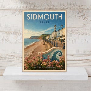 May include: A vertical travel poster featuring a coastal scene of Sidmouth, Devon. The image displays a beach, a promenade with a clock tower, and a decorative mosaic wall in the foreground. The text reads SIDMOUTH - DEVON - WHERE THE COAST SLOWS DOWN.