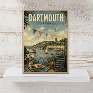 May include: A vertical wall art print featuring a coastal scene of Dartmouth, Devon. The image displays a harbour with boats, a town, and bunting flags. A table in the foreground holds a vase of daisies, a cup, and a pastry next to a chalkboard sign.