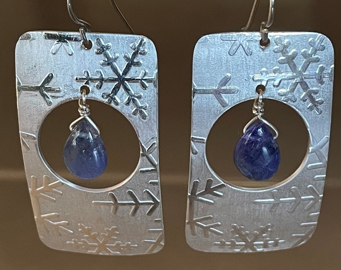 Tanzanite Drops Dangle Inside Fine Silver Rectangles With Snowflakes Dancing Across the Surface
