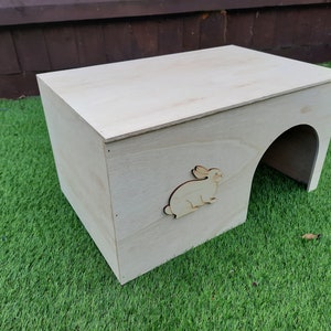 New Large RABBIT house/ shelter/ hide. (FULLY ASSEMBLED) just take out of the box.