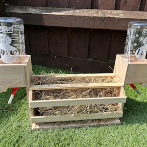 Guinea pig hay and water feeding station. ( comes with or without bottles)