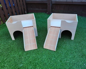 Pair of cage size guinea pig castles 1 right hand ramp 1 left hand.
