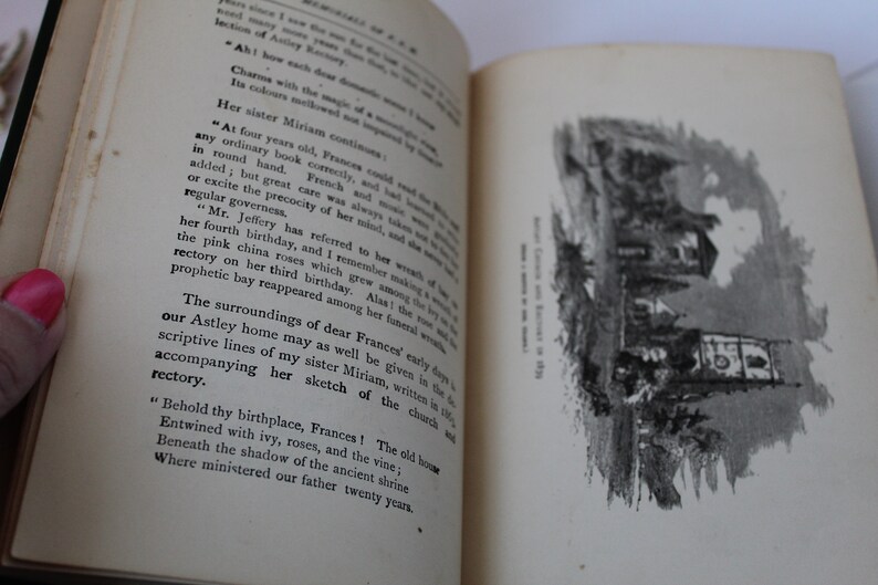 May include: A black and white illustration of a church with a steeple and a sign that reads "Behold thy birthplace, Frances! The old house entwined with ivy, roses, and the vine; Beneath the shadow of the ancient shrine where ministered our father twenty years."