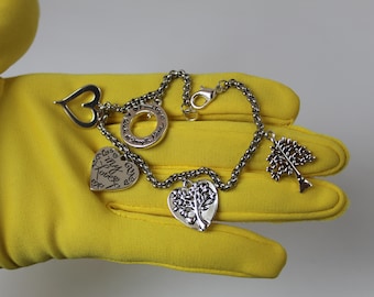 Pulsera con dije familiar "Love This Life" de David Culiner, plateada, con corazones y árboles de la vida, 18 cm y 1/4", en excelente estado.