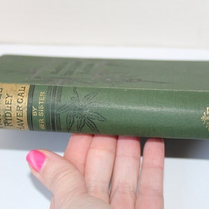 May include: A green hardcover book titled "Memorials of Frances Ridley Havergal by Her Sister".