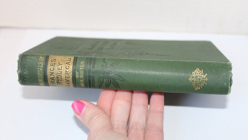 May include: A green hardcover book titled "Memorials of Frances Ridley Havergal by Her Sister".