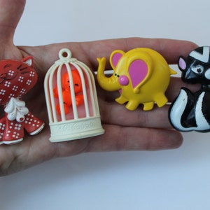 Vintage 1970s Lot of 4 Avon Pin Pals with Perfume Glace Sniffy Skunk 1972, 1973 Elephant, 1975 Bobbin Robin, 73 Calico Cat Pin Pal Lot