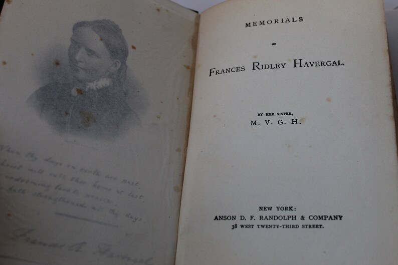 May include: A black and white portrait of Frances Ridley Havergal, the author of the book "Memorials of Frances Ridley Havergal". The book cover features the title, author, and publisher information.