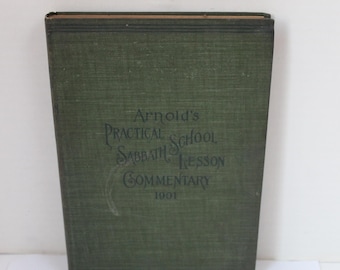 May include: A dark green book with the title "Arnold's Practical School Sabbath Lesson Commentary 1901" printed on the front cover.