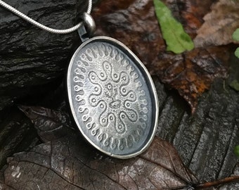Oval Handcrafted Sterling Silver Pendant of 'Ahn dah ogg' - print design by Chris Ballew  *ONLY 1 IN STOCK*