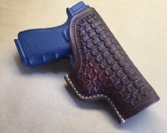 The "Classic" Holster for a Glock 19/23/32..... Traditional OWB Style..... Saddle Leather.....Handtooled..... Handstitched.