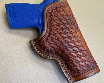 The "Classic" Holster for a S&W MP 45 Shield M2.0..... Traditional OWB Style..... Handmade From Saddle Leather.