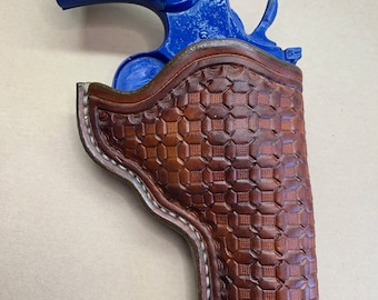 The "Classic" Holster for a Colt Python 4.25" barrel….. Handmade in the USA from Saddle Leather….. Free Shipping.
