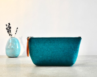 Merino wool felt makeup pouch in dark teal with 8" zipper and leather pull