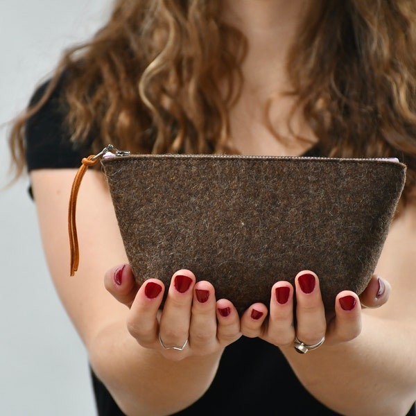 Wool felt cosmetics bag in a dark brown, lined with a pretty floral cotton batik