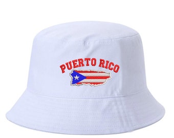 May include: White bucket hat with red embroidered text "PUERTO RICO" and a red, white, and blue embroidered flag of Puerto Rico.