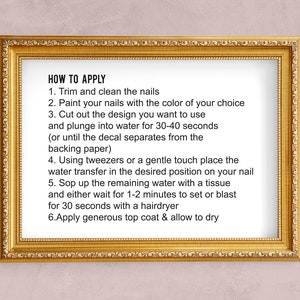 May include: A framed instruction sheet with the title "HOW TO APPLY" and six steps for applying nail decals. The steps include trimming and cleaning nails, painting nails, cutting out the design, plunging the design into water, placing the design on the nail, and applying a top coat.