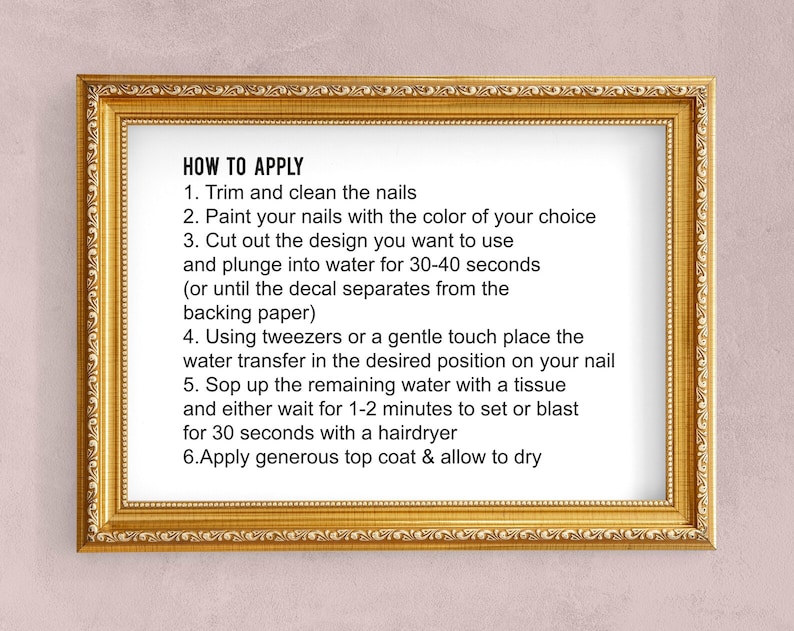 May include: A framed image with instructions on how to apply nail decals. The instructions include steps like trimming nails, painting them, cutting out the design, and placing the decal on the nail.